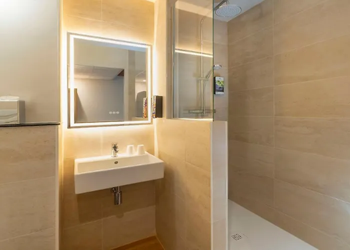 Отель Sure By Western Memorial 3*